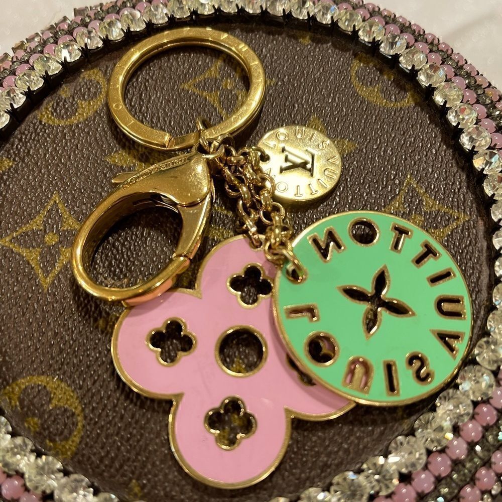 Louis Vuitton authentic bag charm or key ring. Different colors on each side.